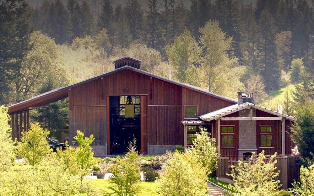 The outside of the Lemelson Vineyards tasting room surrounded by trees